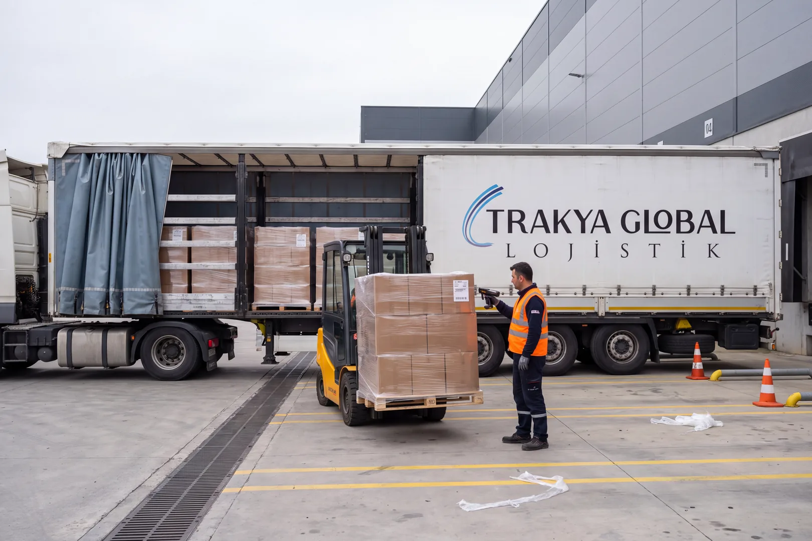 Forklift loading pallets onto a trailer